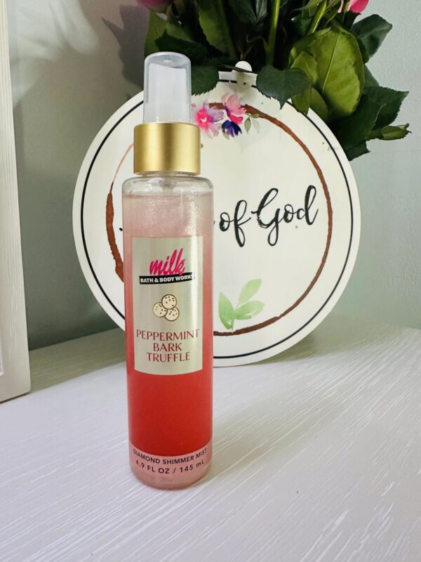 Pink body spray on shelf