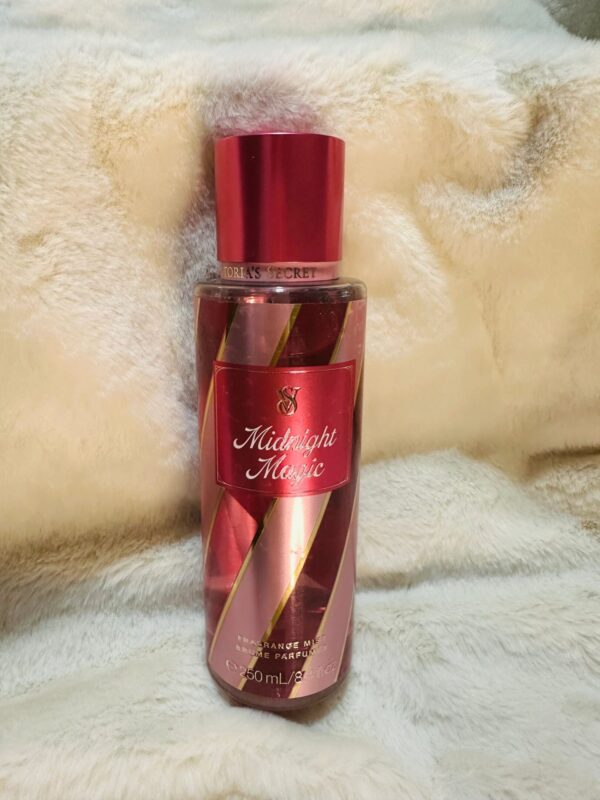 Perfume bottle on a soft fabric background.