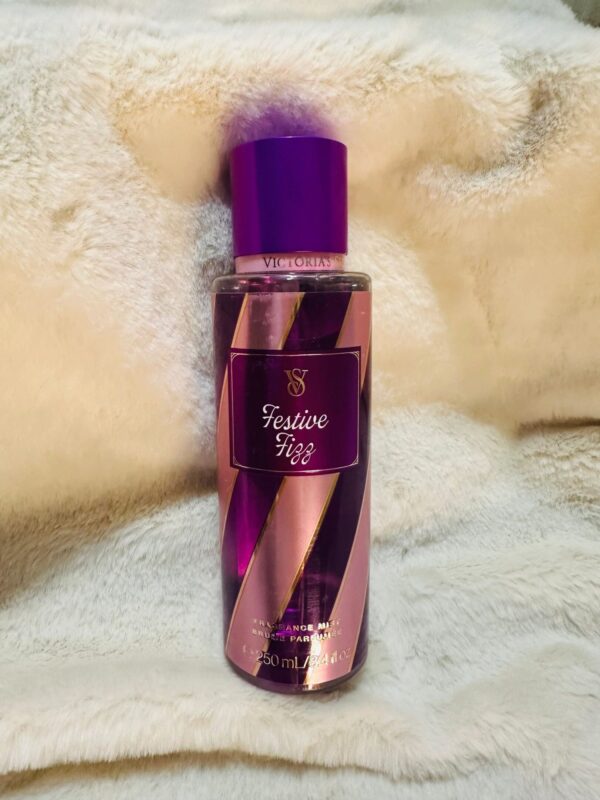 Perfume bottle on soft fur background