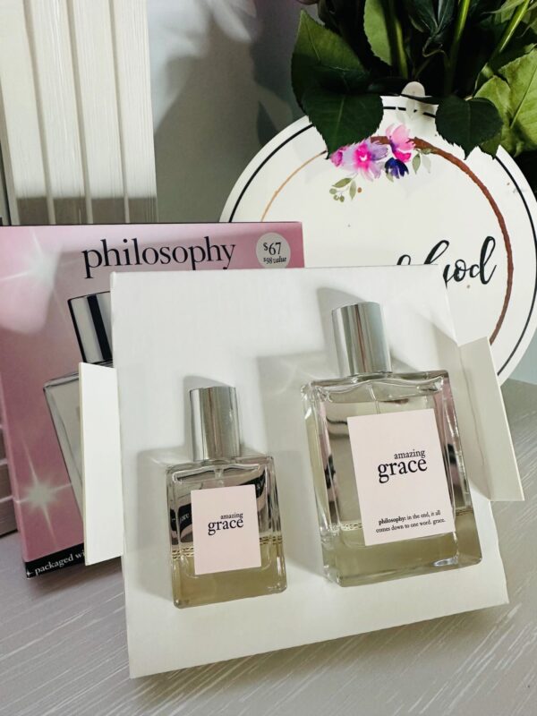 Perfume bottles with floral background